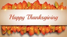 Happy Thanksgiving message in front of fall leaves.