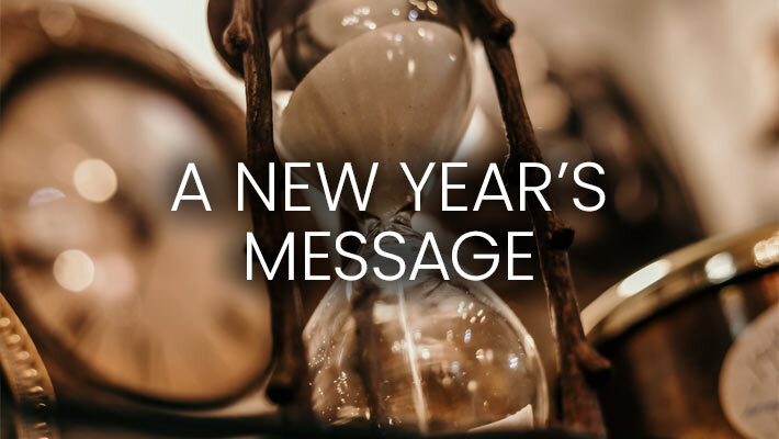 A New Year's Message. An hour glass running out of sand.